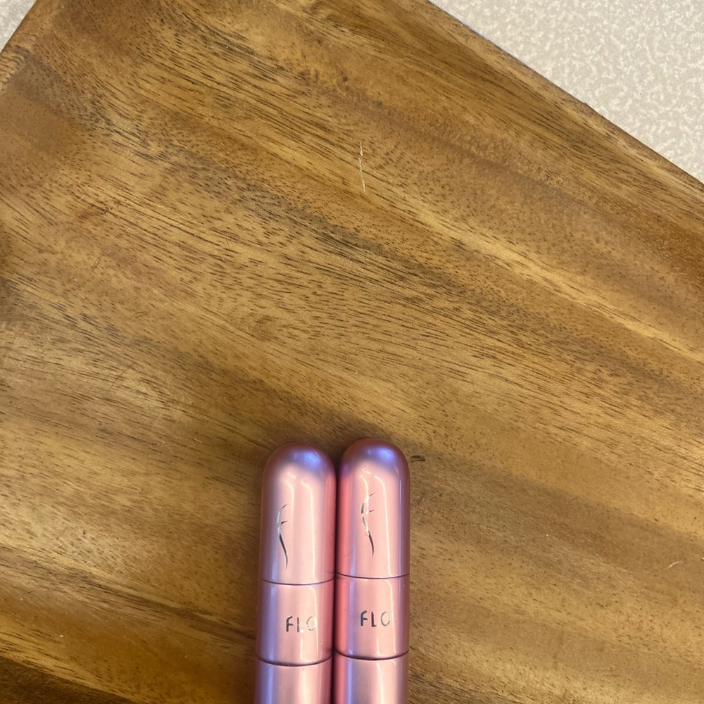 Pink flo travel perfume atomizers... Washed out with rubbing alcohol to clean - Picture 7 of 7